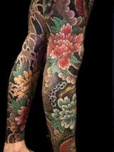 traditional japanese leg-piece tattoo