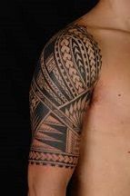 tribal polynesian shoulder-arm tattoo